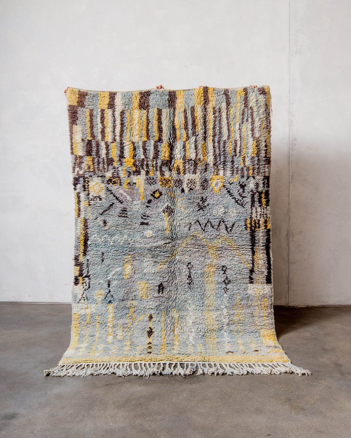 Modern, designer, handcrafted Berber rug from Morocco. Vintage carpet with beautiful colours and patterns and fluffy texture.